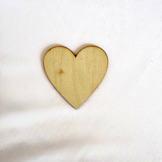 Wooden heart shape on a white background